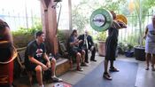 Schwarzenegger pumps up weightlifting team 